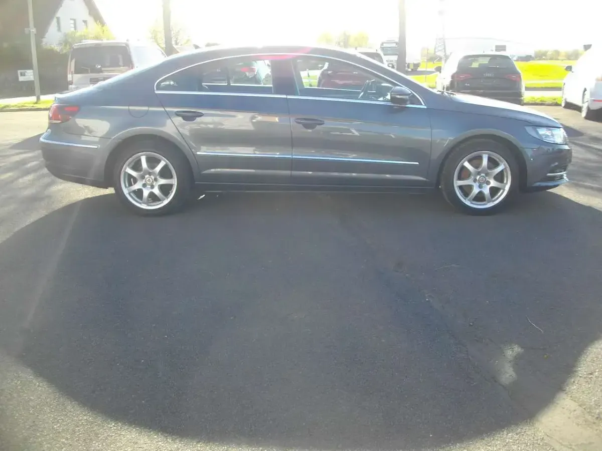 Gebraucht VW Passat 140 PS (102 kW) 2014 Islandgrau perleffekt Coupé