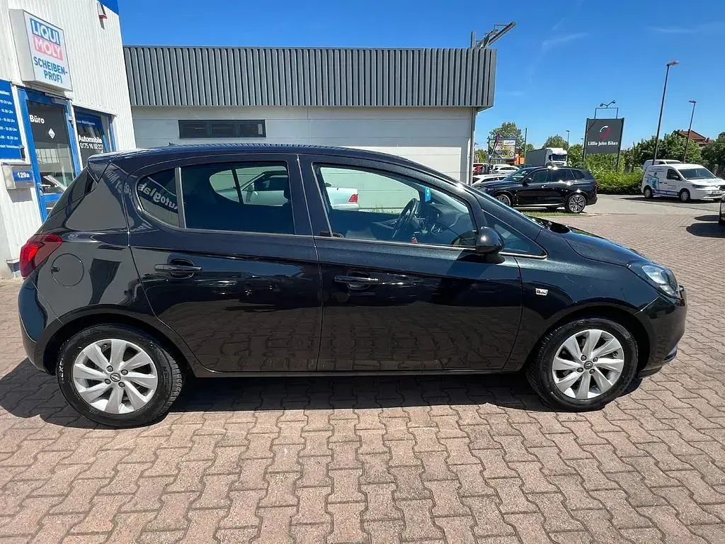 Używany Opel Corsa Edition 90 KM (66 kW) 2015 Czarny Hatchback