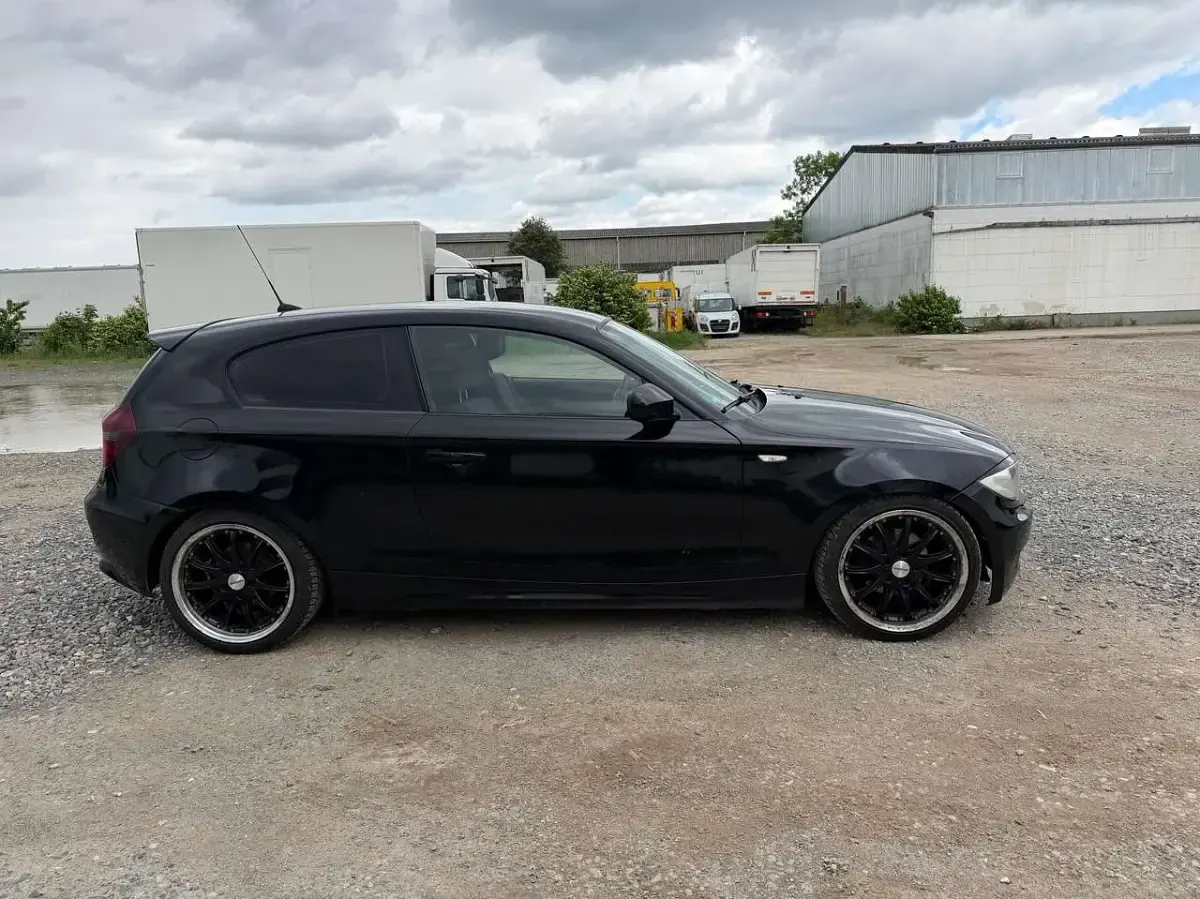 Używany BMW 116 122 KM (89 kW) 2011 Czarny Hatchback