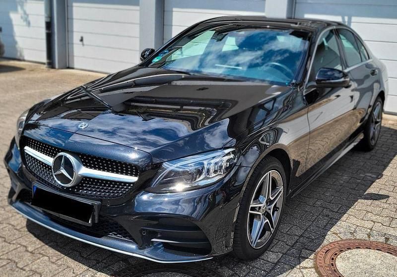 Schwarz Gebraucht 2019 Mercedes C220 AMG line Limousine | 25.100 € (Superpreis) - Bild 1/4