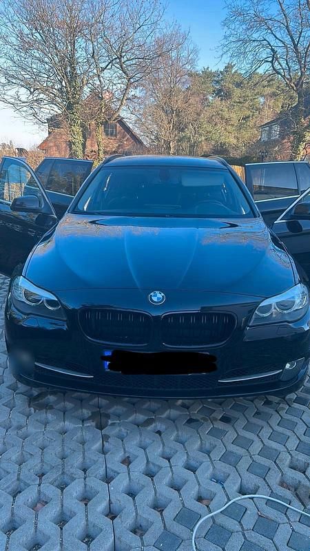 Gebraucht BMW 520 184 PS (135 kW) 2011 Schwarz Kombi