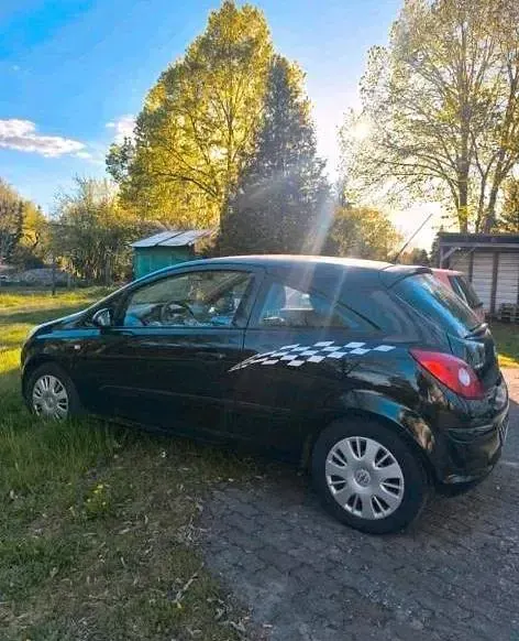 Second-hand Opel Corsa 59 CP (43 kW) 2008 Negru Hatchback
