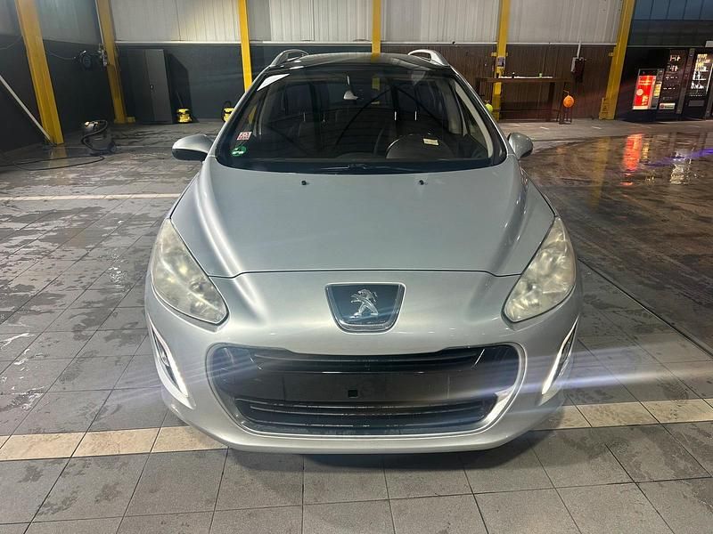 Silber Gebraucht 2014 Peugeot 308 SW Kombi | 6.990 € - Bild 1/4