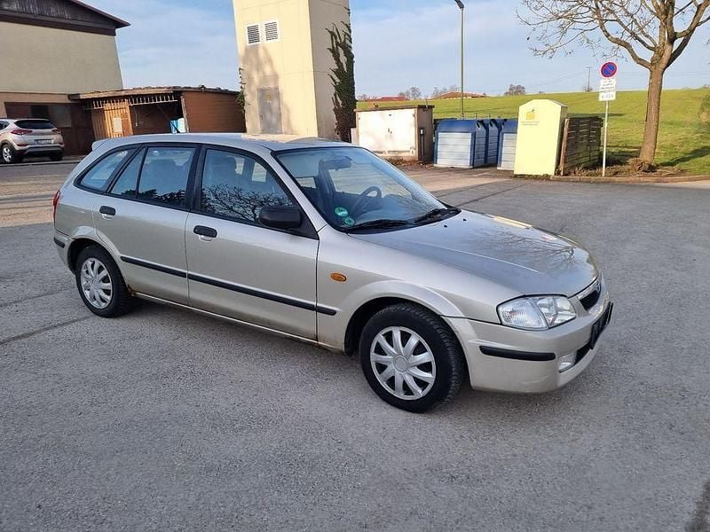 Second-hand Mazda 323 88 CP (64 kW) 1998 Gri Berlinǎ