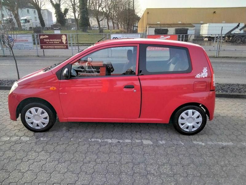 Gebraucht Daihatsu Cuore Plus 58 PS (42 kW) 2006 Rot Kleinwagen