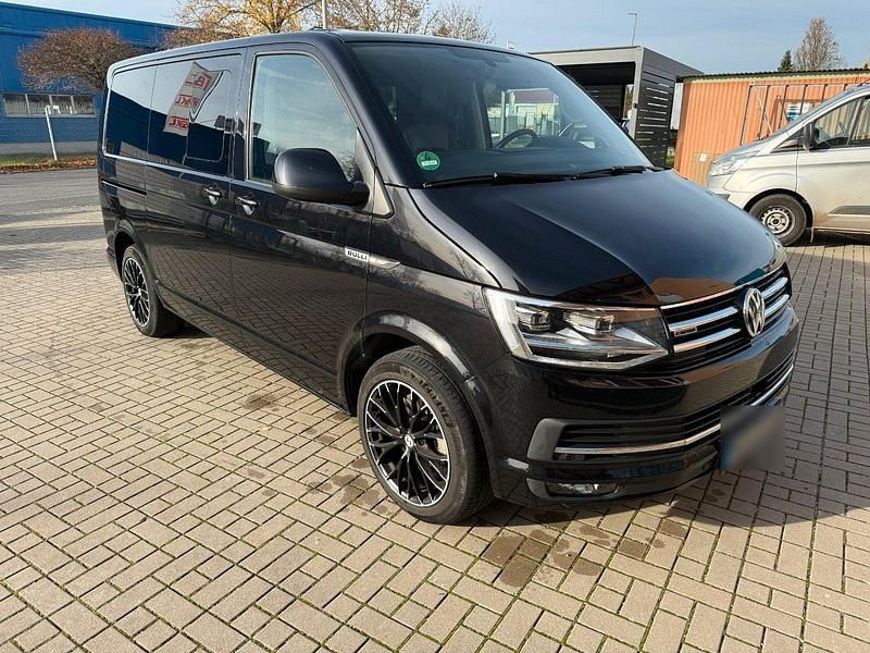Schwarz Gebraucht 2016 VW Multivan Highline Van | 27.299 € (Superpreis) - Bild 1/4