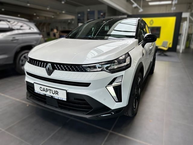 Perlmuttweiss metallic/dach i Gebraucht 2024 Renault Captur Techno SUV | 27.590 € (Guter Preis) - Bild 1/4