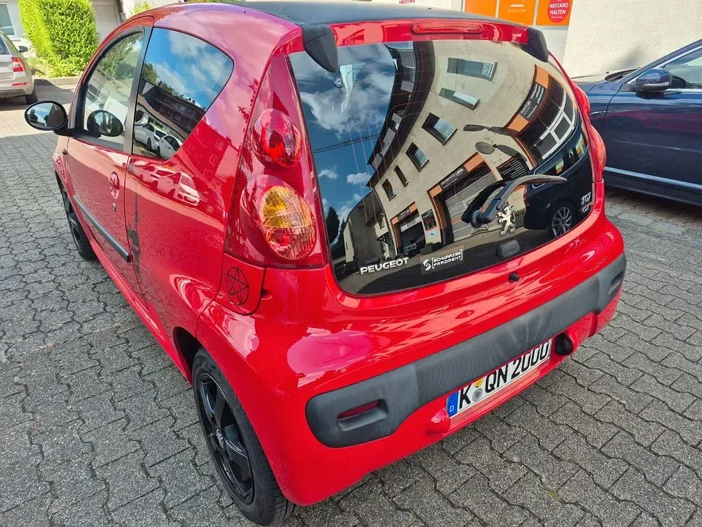 Gebraucht Peugeot 107 68 PS (50 kW) 2011 Rot Kleinwagen