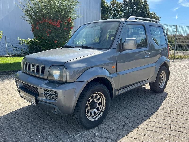 Grau Gebraucht 2006 Suzuki Jimny Snow SUV | 4.990 € (Superpreis) - Bild 1/4