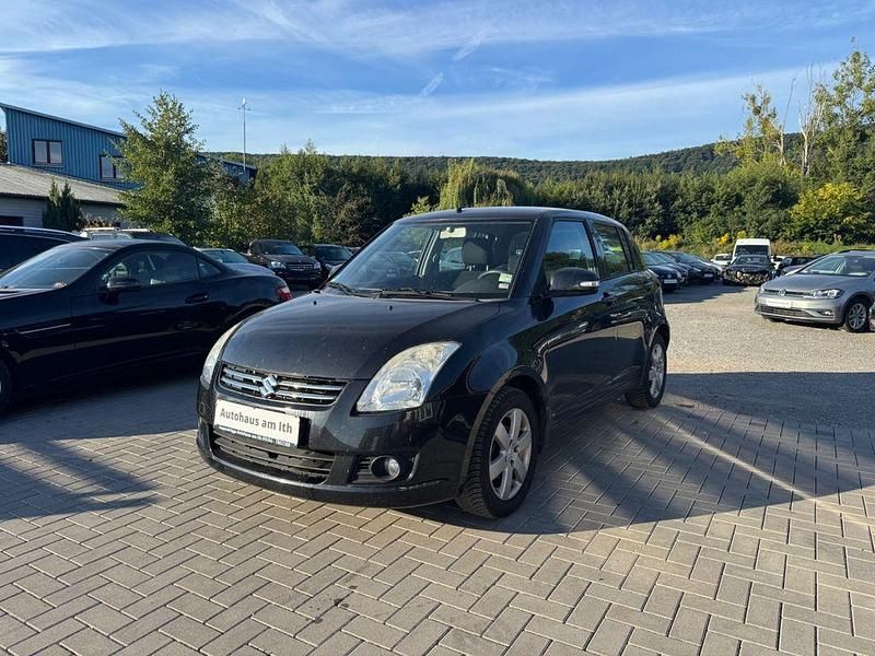 Schwarz Gebraucht 2010 Suzuki Swift Club Limousine | 3.490 € (Fairer Preis) - Bild 1/4