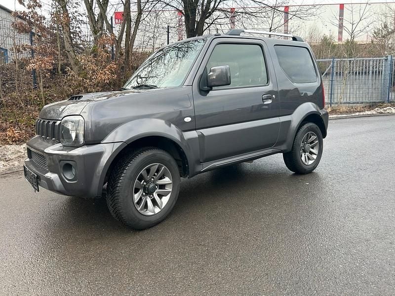 Grün Gebraucht 2016 Suzuki Jimny SUV | 15.900 € (Fairer Preis) - Bild 1/4
