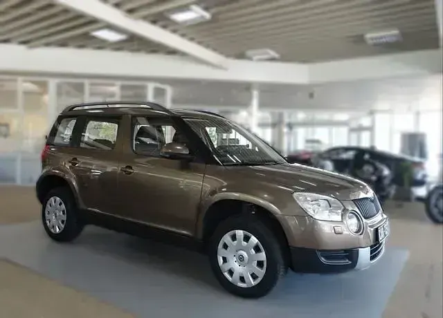 Gebraucht Skoda Yeti Active 105 PS (77 kW) 2013 Braun SUV