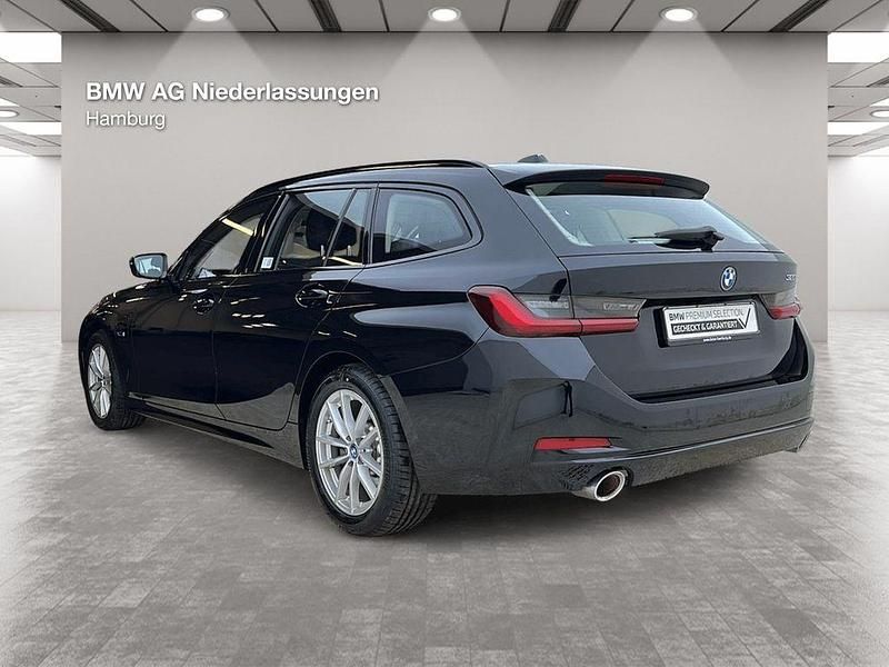 Gebraucht BMW 320e 163 PS (119 kW) 2022 Schwarz Kombi