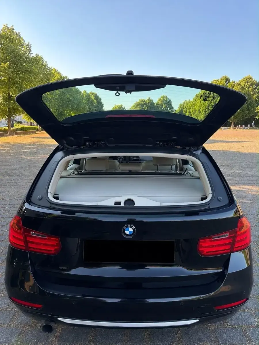 Gebraucht BMW 320 Sport Line 184 PS (135 kW) 2014 Schwarz Kombi