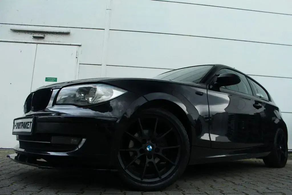 Second-hand BMW 116 Performance 122 CP (89 kW) 2009 Negru Hatchback