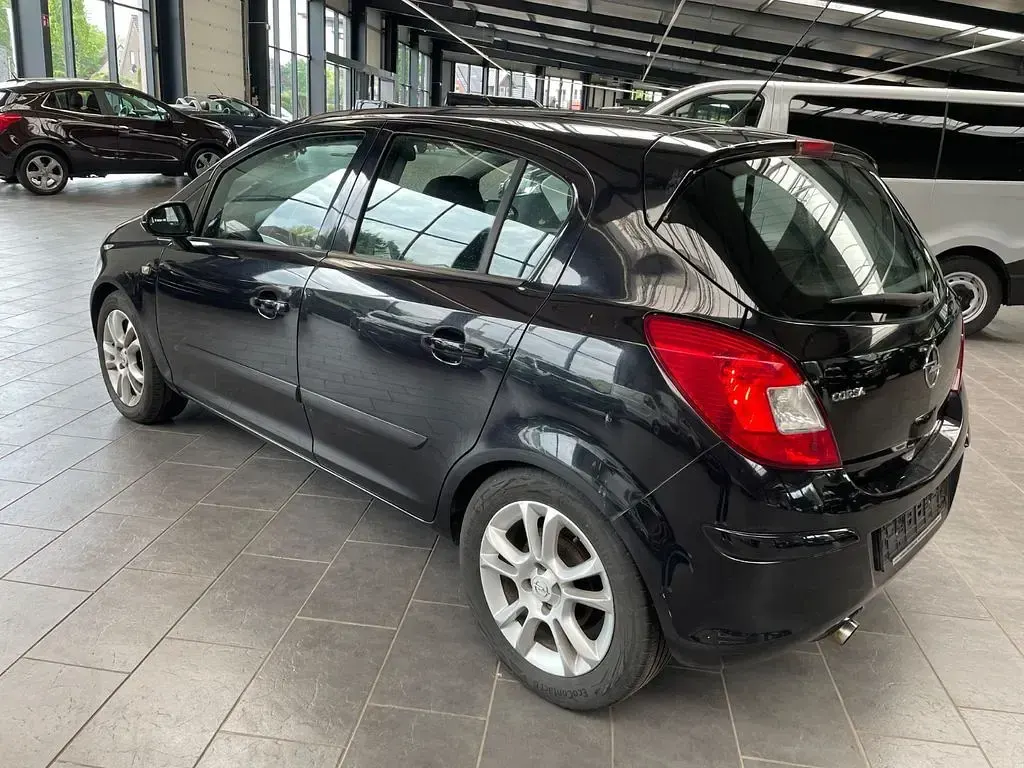 Gebraucht Opel Corsa Sport 80 PS (58 kW) 2007 Saphirschwarz mi2 (metallic) Kleinwagen