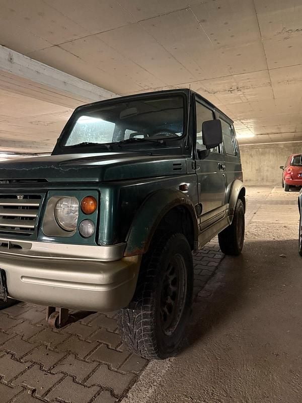 Grün Gebraucht 2003 Suzuki Samurai SUV | 2.300 € - Bild 1/4