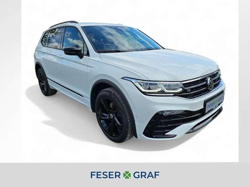 Oryxweiß perlmutteffekt Gebraucht 2024 VW Tiguan Allspace R-line SUV | 39.440 € (Superpreis) - Bild 1/4