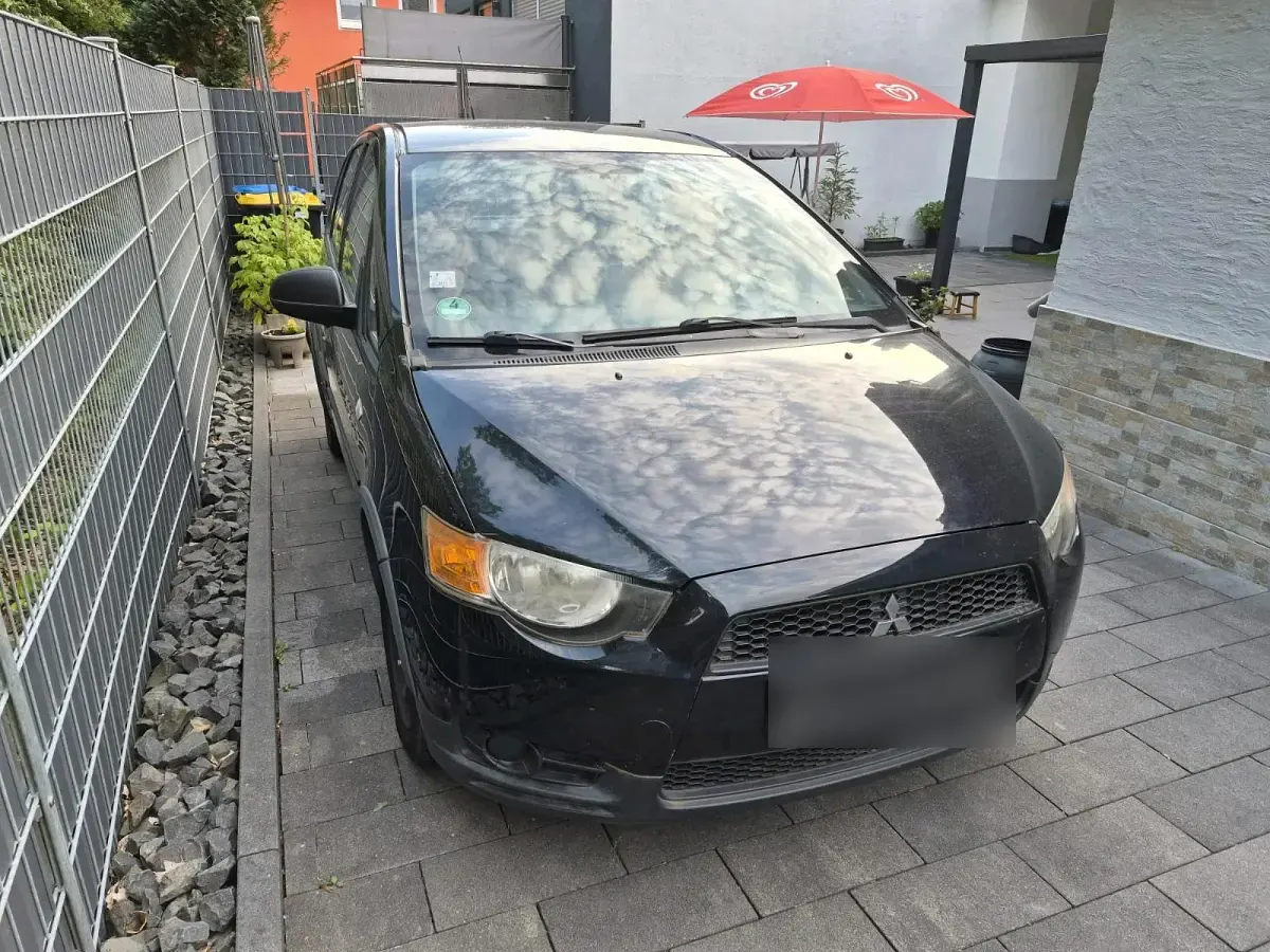 Gebraucht Mitsubishi Colt 95 PS (69 kW) 2010 Schwarz Kleinwagen