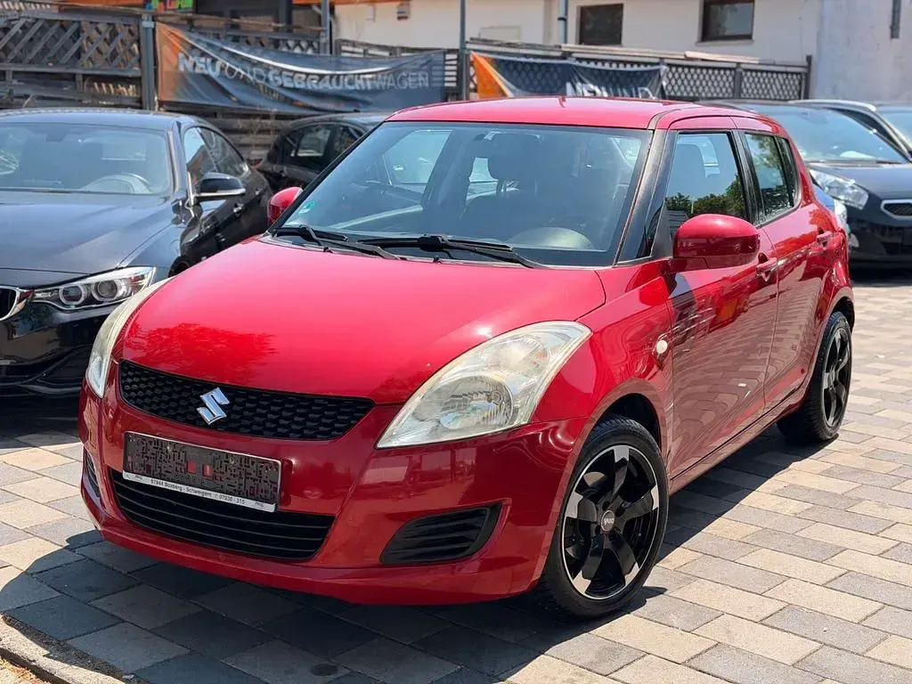 Gebraucht Suzuki Swift Club 94 PS (69 kW) 2010 Rot Kleinwagen