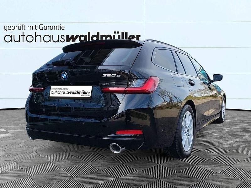 Gebraucht BMW 320e 204 PS (150 kW) 2023 Schwarz Kombi