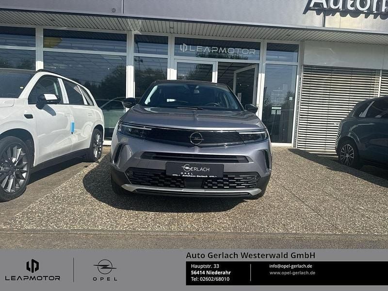 Gebraucht Opel Mokka-e Elegance 100 kW (136 PS) 2021 Quartz/artense grey SUV