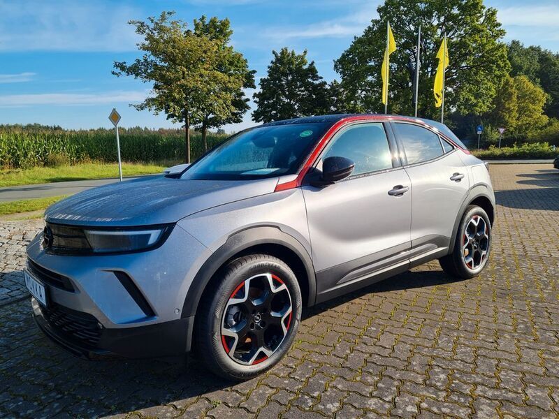 Grau Gebraucht 2024 Opel Mokka-e GS Line SUV | 32.950 € - Bild 1/4