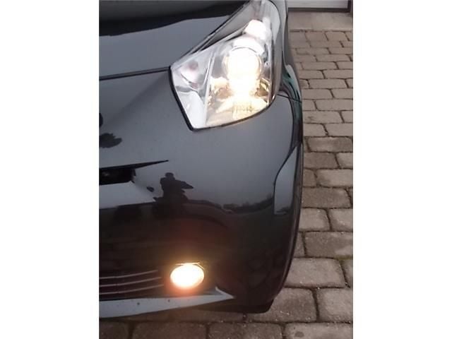 Gebraucht Toyota iQ 68 PS (50 kW) 2010 Schwarz metallic Kleinwagen