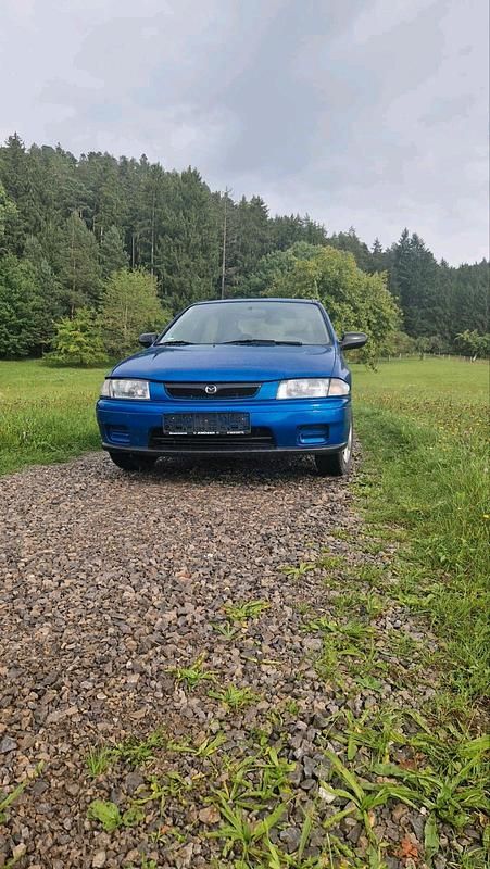 Blau Gebraucht 1997 Mazda 323 Kleinwagen | 1.999 € (Teuer) - Bild 1/4