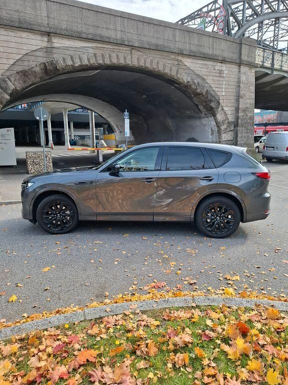Grau Gebraucht 2023 Mazda CX-60 Homura-Line SUV | 39.500 € (Fairer Preis) - Bild 1/4