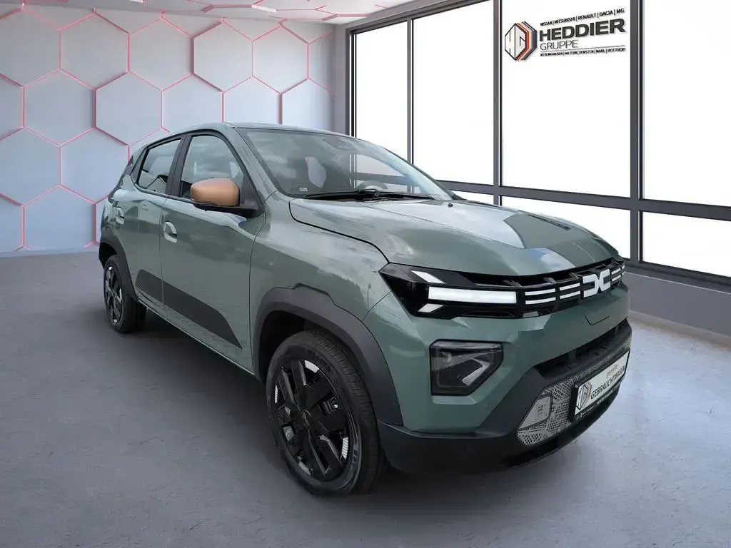 Gebraucht Dacia Spring Extreme 47 kW (65 PS) 2025 Olivgrün Kleinwagen