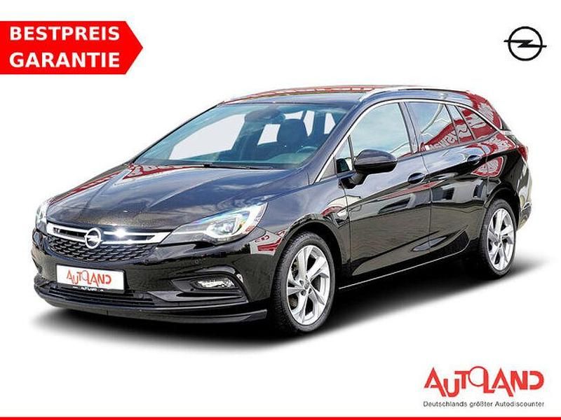 Onyx schwarz (metallic) Gebraucht 2018 Opel Astra Dynamic Kombi | 16.490 € - Bild 1/4