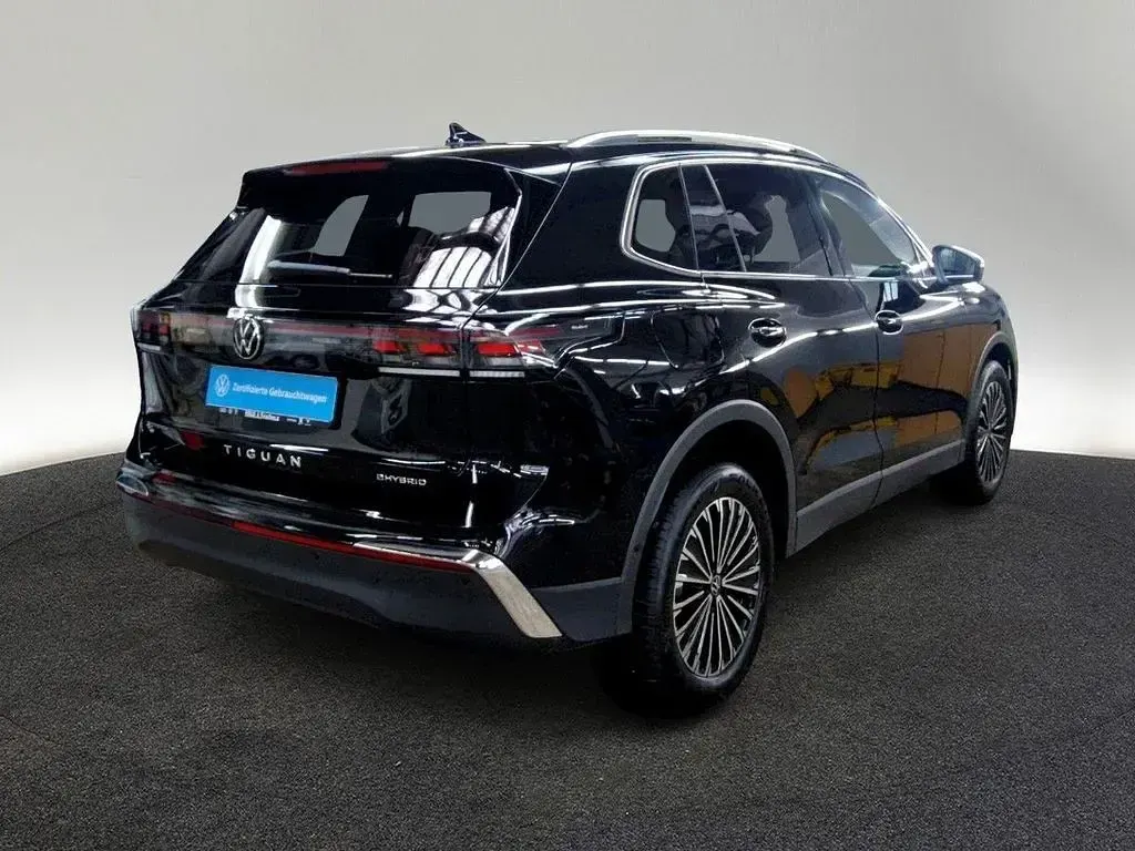 Gebraucht VW Tiguan Elegance 272 PS (200 kW) 2025 0e grenadillschwarz metallic SUV