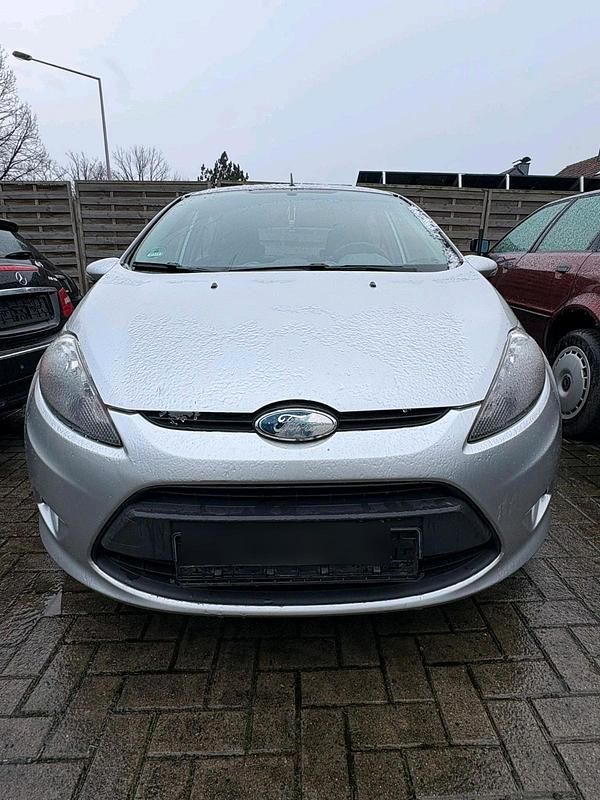 Grau Gebraucht 2009 Ford Fiesta Kleinwagen | 1.899 € - Bild 1/4