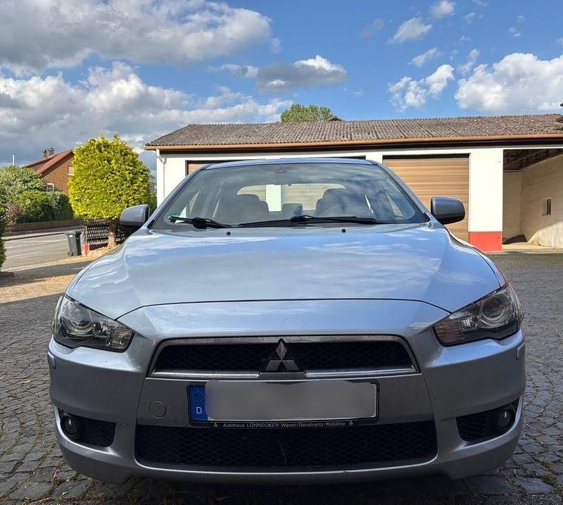 Grau Gebraucht 2012 Mitsubishi Lancer Limousine | 4.000 € (Fairer Preis) - Bild 1/4