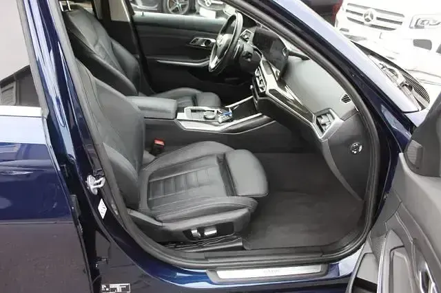 Gebraucht BMW 330 Comfort Edition 286 PS (210 kW) 2023 Tansanitblau ii metallic Kombi