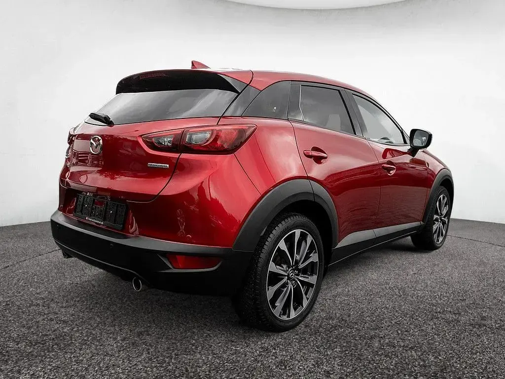 Używany Mazda CX-3 Ad'Vantage 121 KM (88 kW) 2021 Czerwony SUV