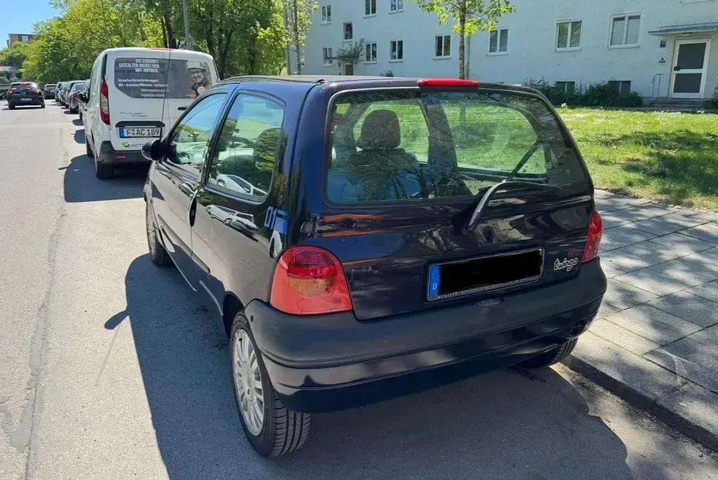Używany Renault Twingo 75 KM (55 kW) 2004 Purpurowy Hatchback