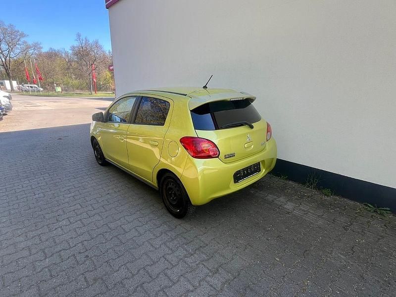 Gebraucht Mitsubishi Space Star 80 PS (58 kW) 2014 Gelb Van / Kleinbus