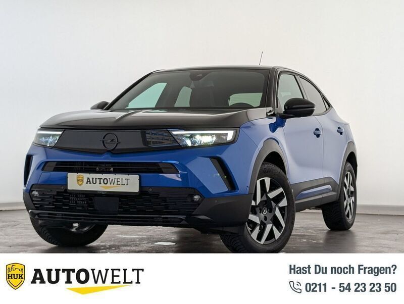 Lackierung voltaic blue met/ty Gebraucht 2023 Opel Mokka SUV | 22.460 € (Guter Preis) - Bild 1/4