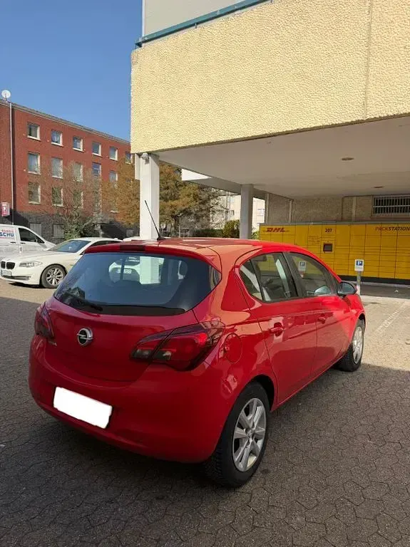 Używany Opel Corsa Edition 90 KM (66 kW) 2017 Czerwony Hatchback