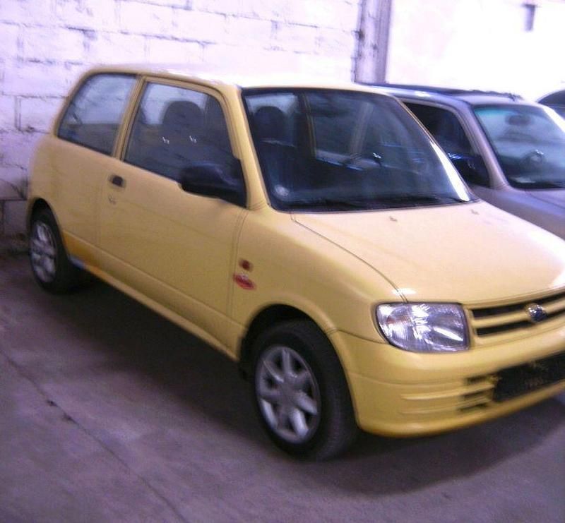 Gelb Gebraucht 2000 Daihatsu Cuore Kleinwagen | 649 € (Fairer Preis) - Bild 1/4