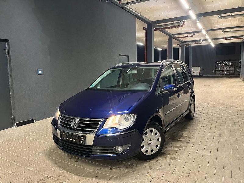 Blau Gebraucht 2006 VW Touran Highline Van / Kleinbus | 2.499 € (Fairer Preis) - Bild 1/4