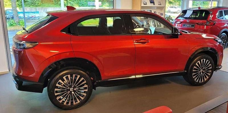 Gebraucht Honda e:Ny1 150 kW (204 PS) 2024 Vermilion rot pearl SUV