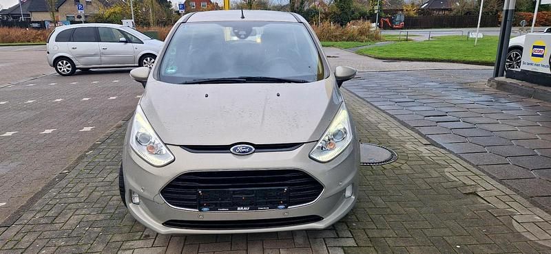 Grau Gebraucht 2013 Ford B-MAX Van / Kleinbus | 6.990 € (Fairer Preis) - Bild 1/4