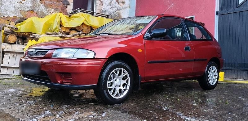 Gebraucht Mazda 323F Edition 88 PS (64 kW) 1998 Braun Kleinwagen