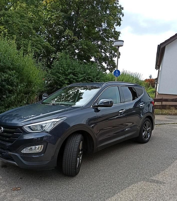 Grau Gebraucht 2014 Hyundai Grand Santa Fe SUV | 15.000 € (Superpreis) - Bild 1/4