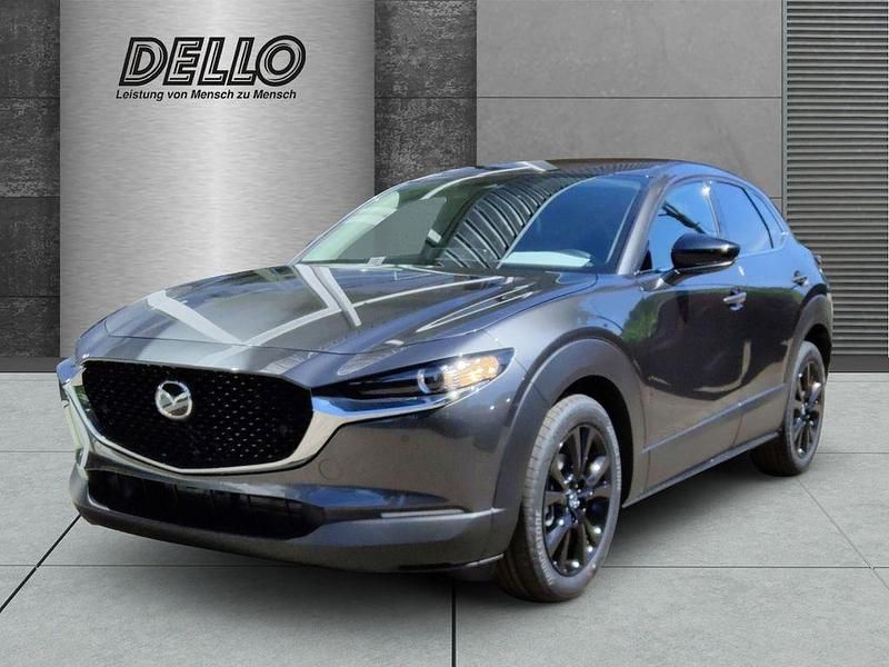 Machine grey Gebraucht 2025 Mazda CX-30 Homura-Line SUV | 30.490 € - Bild 1/4