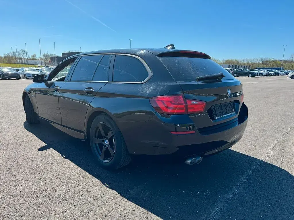 Gebraucht BMW 520 184 PS (135 kW) 2013 Schwarz Kombi