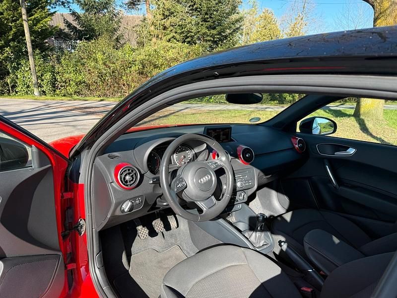 Second-hand Audi A1 Attraction 86 CP (63 kW) 2013 Roșu Hatchback